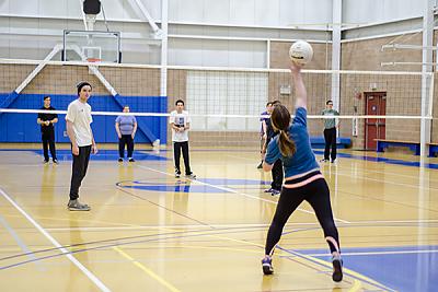 Landmark College students playing volleyball in Click Center